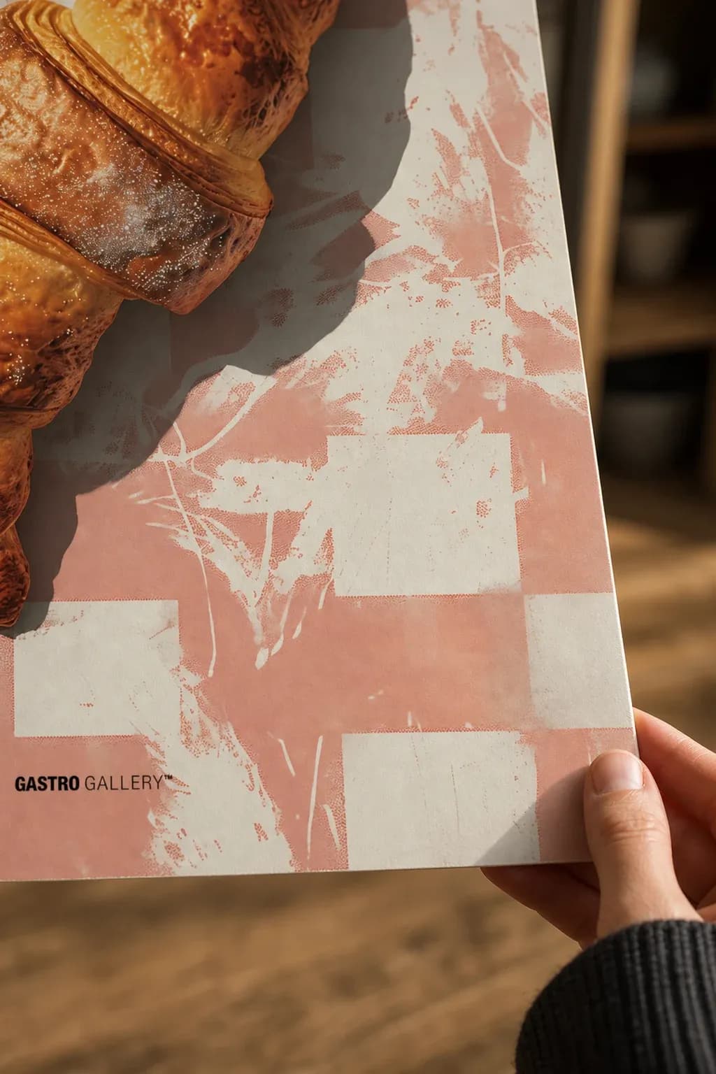 Croissant on Pink — framed on a wall
